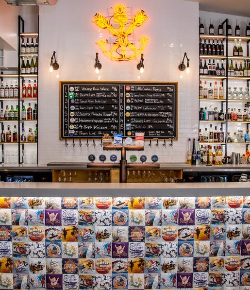 the-fully-stocked-bar-at-six-tanks,-d-,jpg