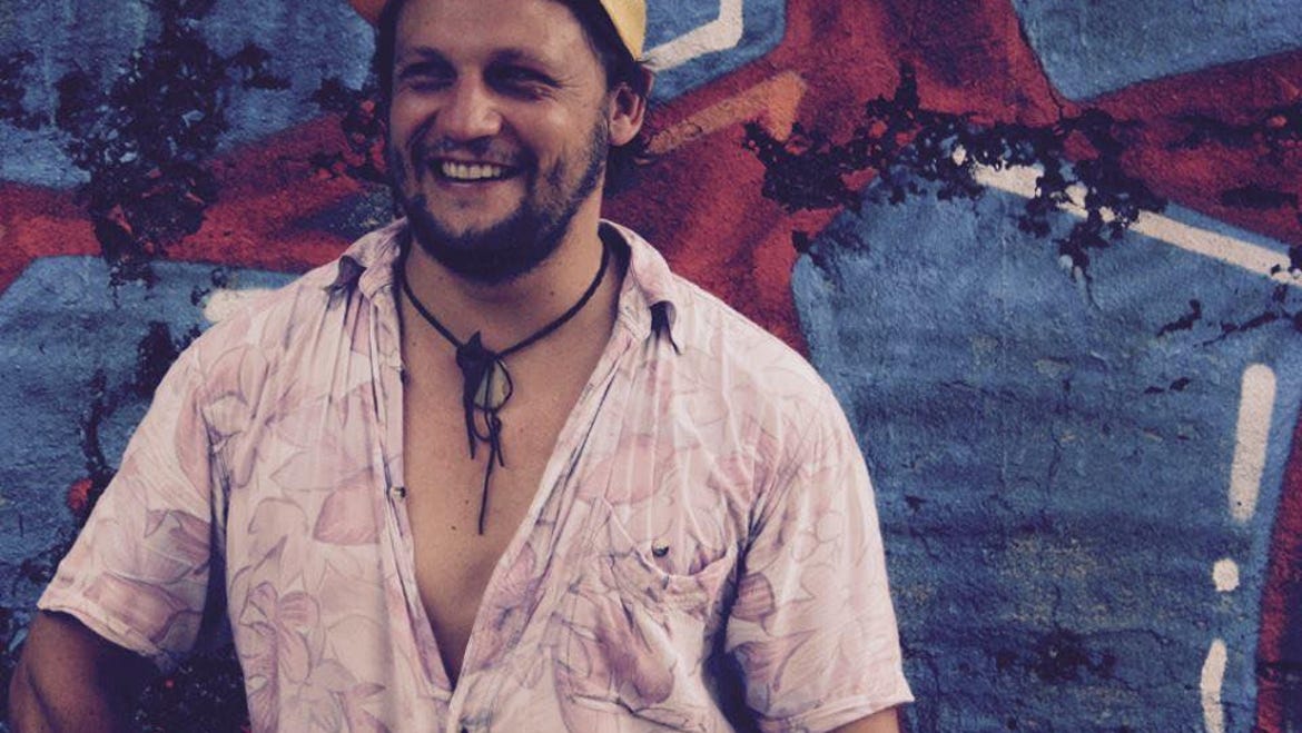 Ben Evolent infront of graffiti wall in Darwin