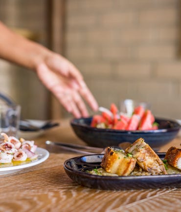 Share plates of food at PM Eat and Drink in Darwin CBD