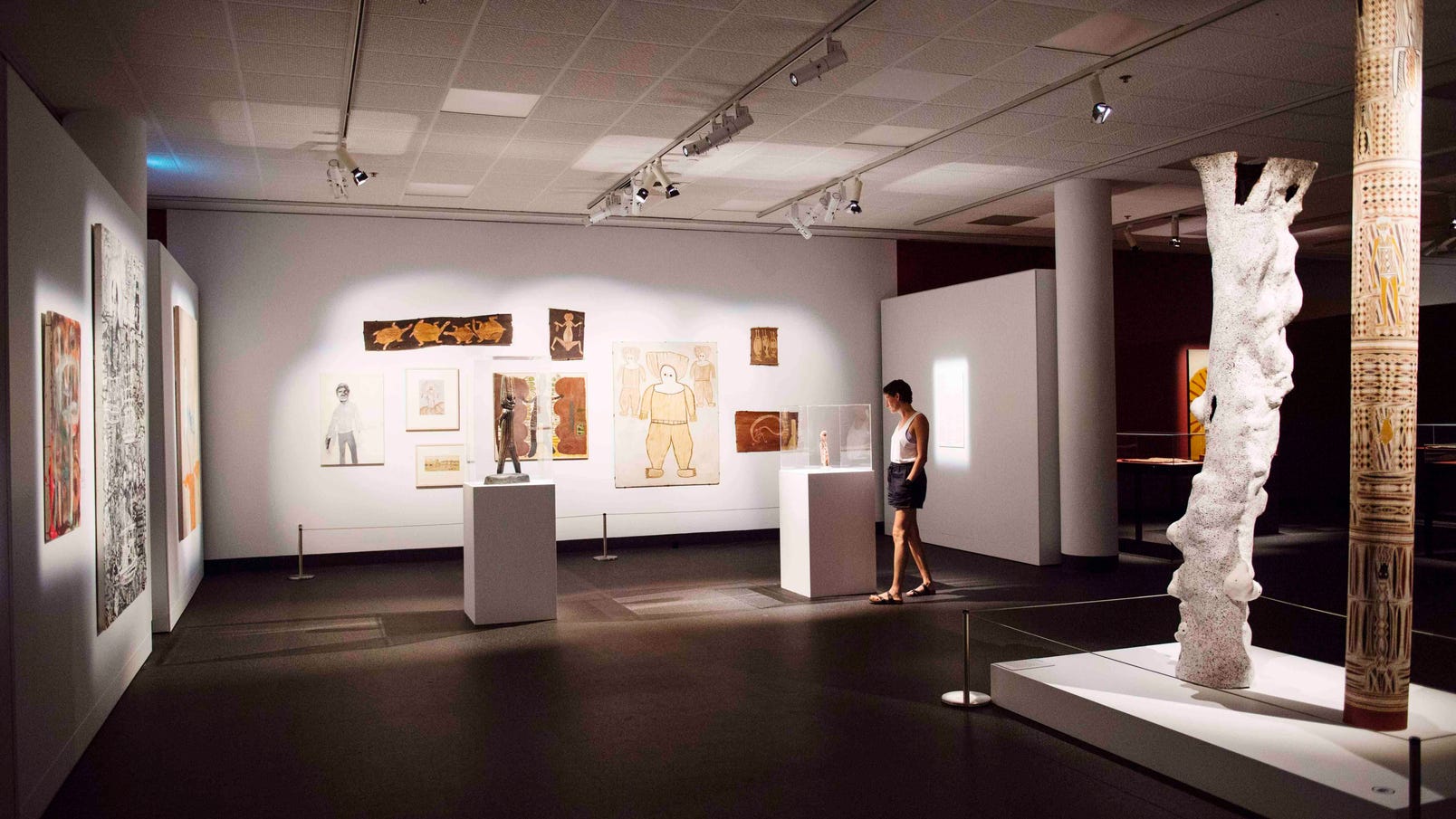 Woman browsing art Museum and Art Gallery Northern Territory