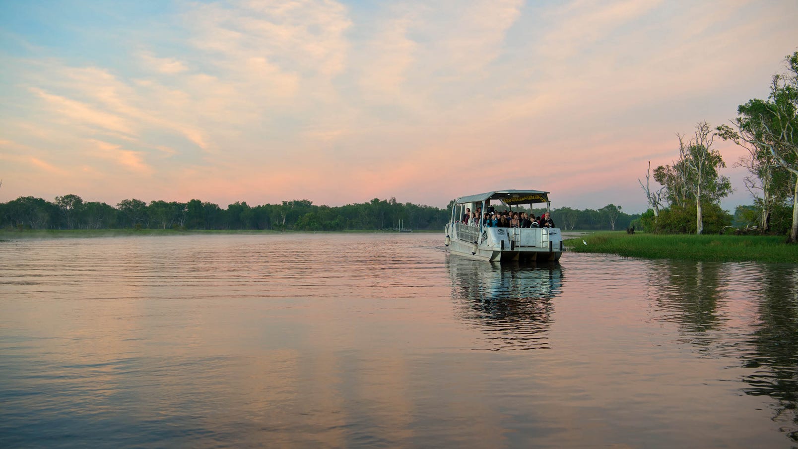 cruise boat on the yellow water billabong in kakadu national park