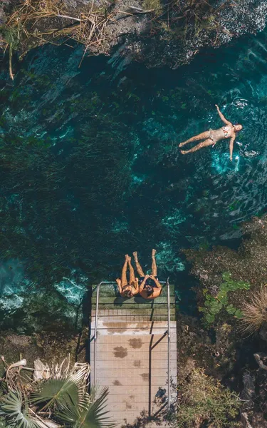 Aerial view of people swimming at Bitter Springs