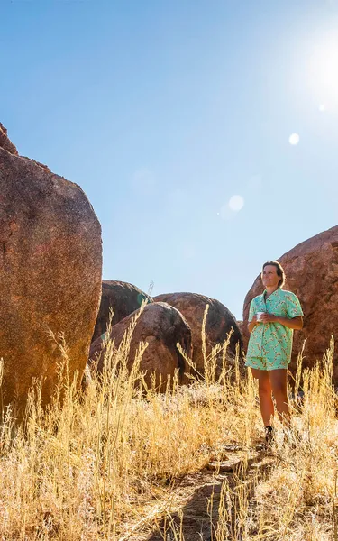 woman-exploring-devils-marbles-in-tennant-creek,-d-,jpg
