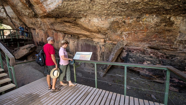 Pointing out rock art in kakadu