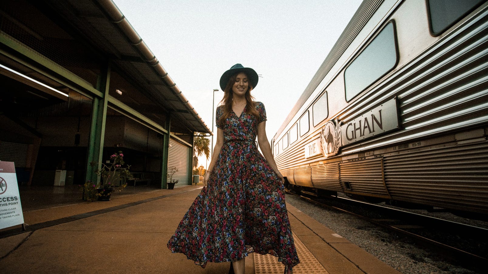 girlwalkingbesidetheghantrain-1jpg