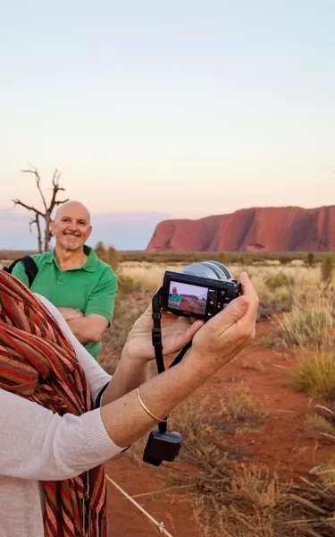 Taking a photo at Uluru
