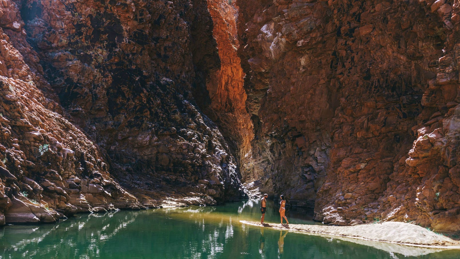 A couple about to swim at Redbank Gorge