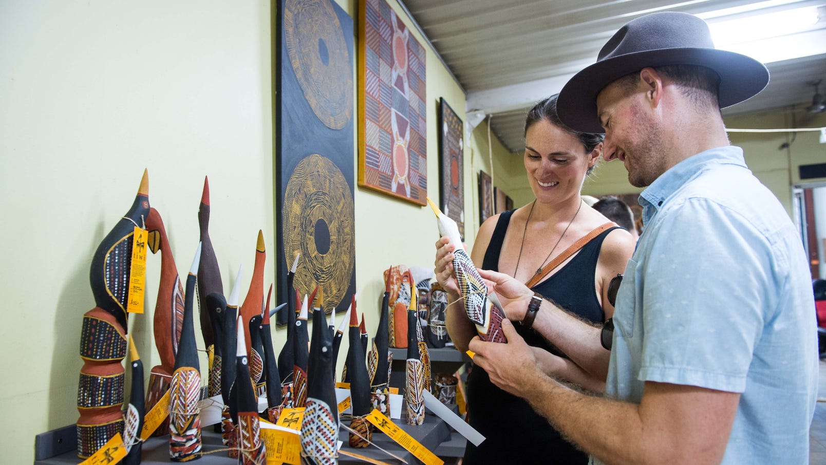 Couple looking at Tiwi Islands Art