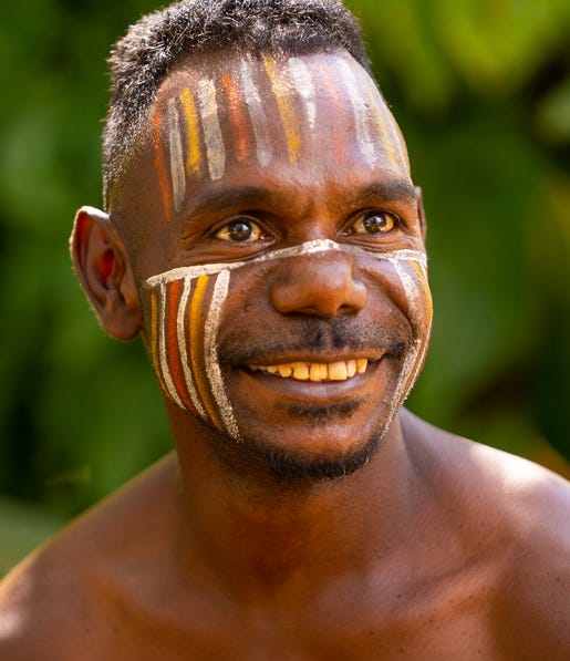 An Aboriginal man in traditional ceremonial makeup on the Tiwi Islands