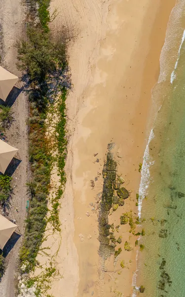 Aerial view of Banu Banu Beach Retreat and the beach in Arnhem Land