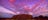 Uluru_at_sunrise_with_pink_clouds.jpg