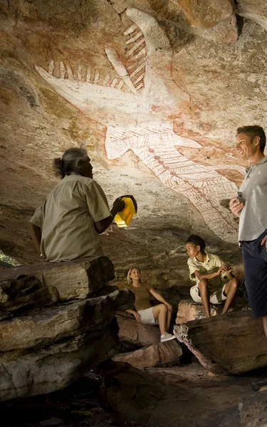 Viewing Aboriginal rock art on a guided tour at Mt Borradaile in Arnhem Land