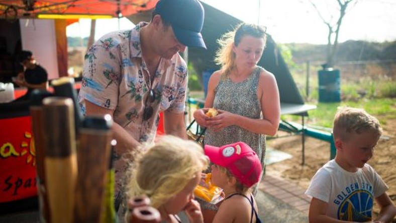 Family eating at Mindil Beach Markets