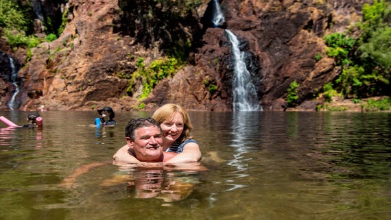 2-couple swimming at wangi falls litchfield national park,-d-,jpg