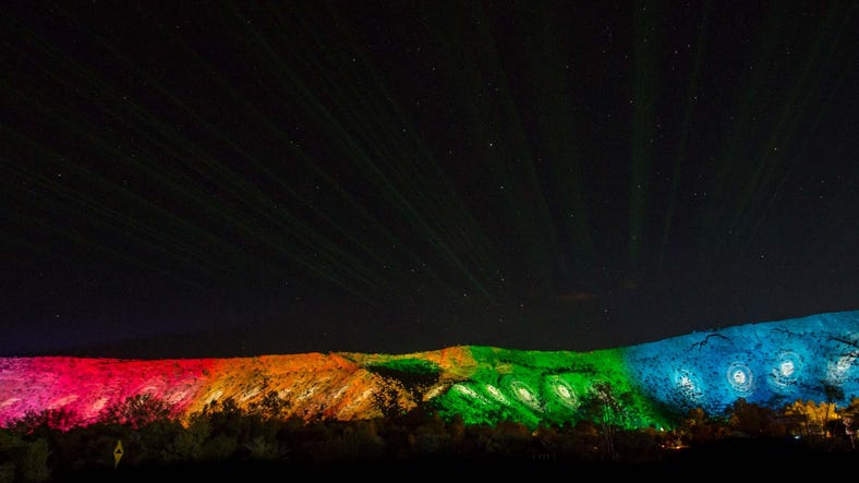 Light installation lighting up the mountain ranges