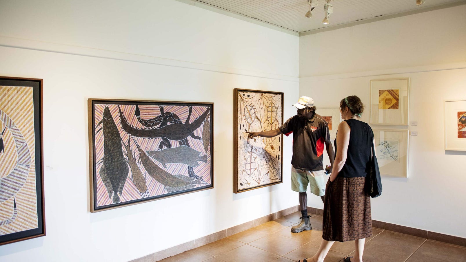 Two people in a Aboriginal Art Centre