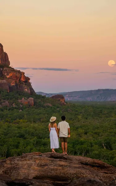Couple standing together at Nawurlandja lookout in Kakadu National Park