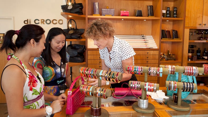 Visitors shopping at high-end fashion store di CROCO