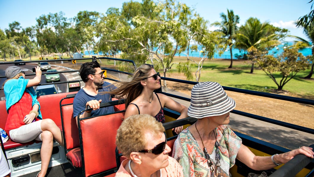 visitors-travelling-on-a-bus-tour-to-east-point,-d-,jpg