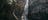 person_standing_at_motor_car_falls.jpg