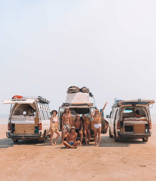 Group of friends parked up on the beach at Gunn Point
