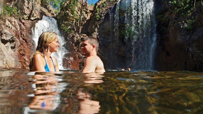 1-A couple swimming at Florence Falls in Litchfield National Park