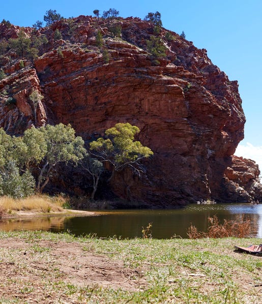 A couple having a picnic at Ellery Creek near Alice Springs