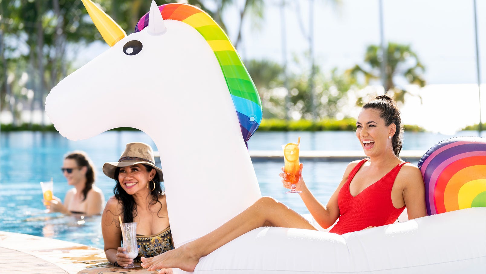 mbcr pool girl floating with drinks