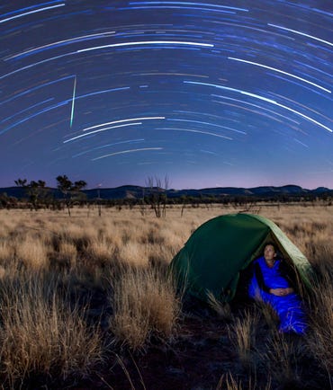star timelapse over a camping woman around alice springs,-d-,jpg