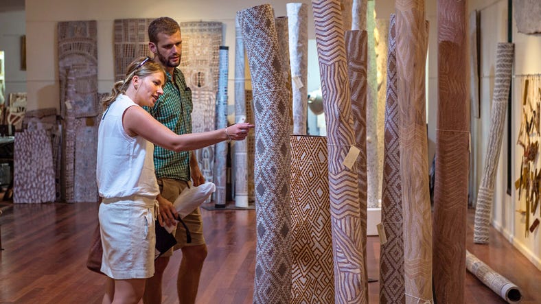2-Couple looking at aboriginal art at Buku Larrnggay Mulka arts-centre