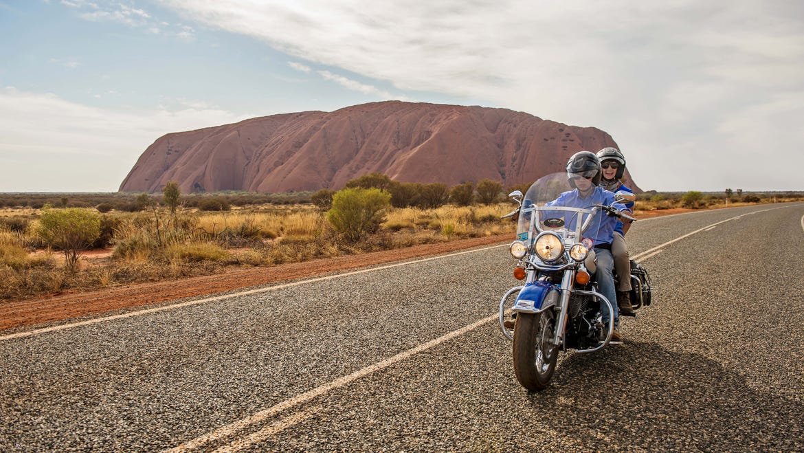Harley davidson ride with Uluru in the background