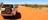 4WD driving on dirt road through Simpson Desert