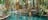 Woman_enjoying_crystal_clear_waters_of_Mataranka_Thermal_Pools.jpg