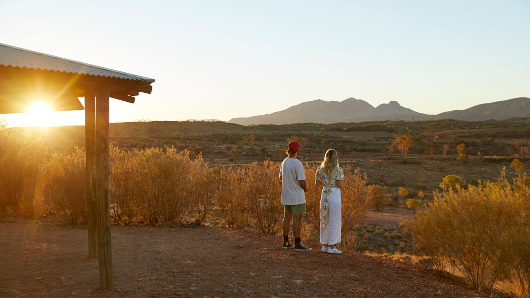 Couple enjoy sunset over kings canyon