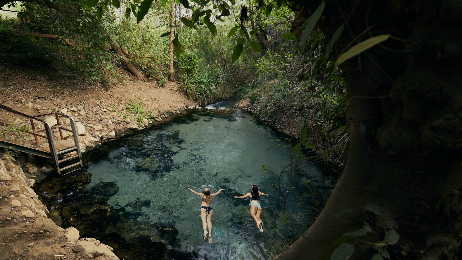 Two girls swimming in Katherine Hot Springs