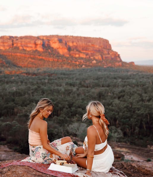 Friends enjoying nibbles at the top of Nourlangie rock