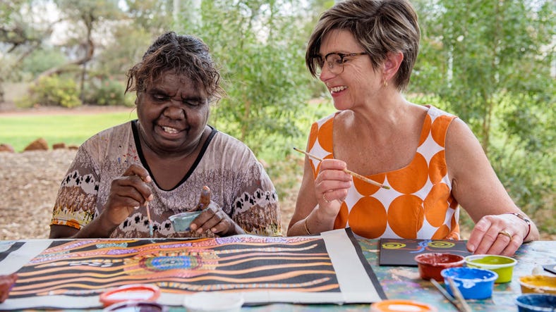 Maruku Arts dot painting workshop in Uluru