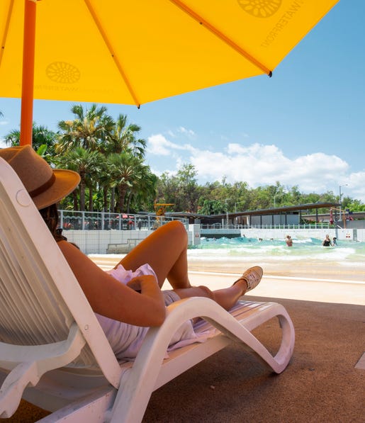 Woman on a sun lounge at the Darwin Waterfront