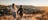 A young couple walking down ANZAC Hill