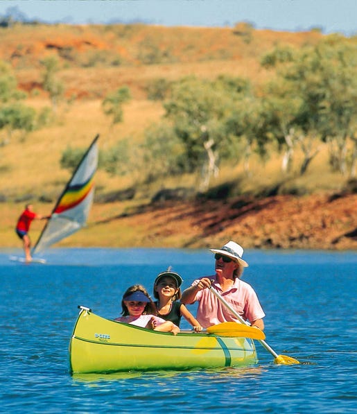 Family kayaking on Lake Maryann near Tennant Creek