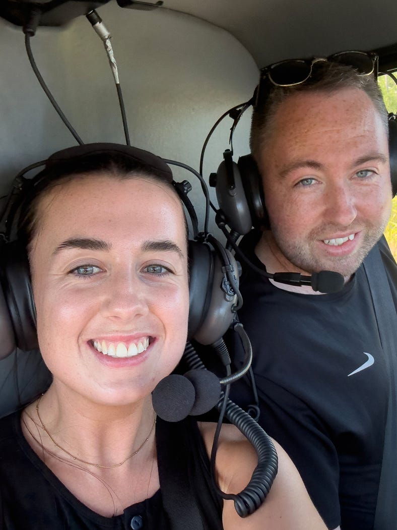 Emma taking helicopter flight