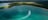 Aerial_view_of_boat_in_Seven_Spirit_Bay_on_the_Coborg_Peninsula.jpg