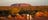 Couple-walking-with-Uluru-in-background