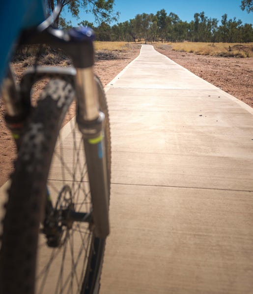 Bicycle riding along the simpsons gap path in alice springs