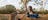littlekangaroolisteningtoanaboriginaltourguideplayingthedidgeridooattopdidj-1jpg