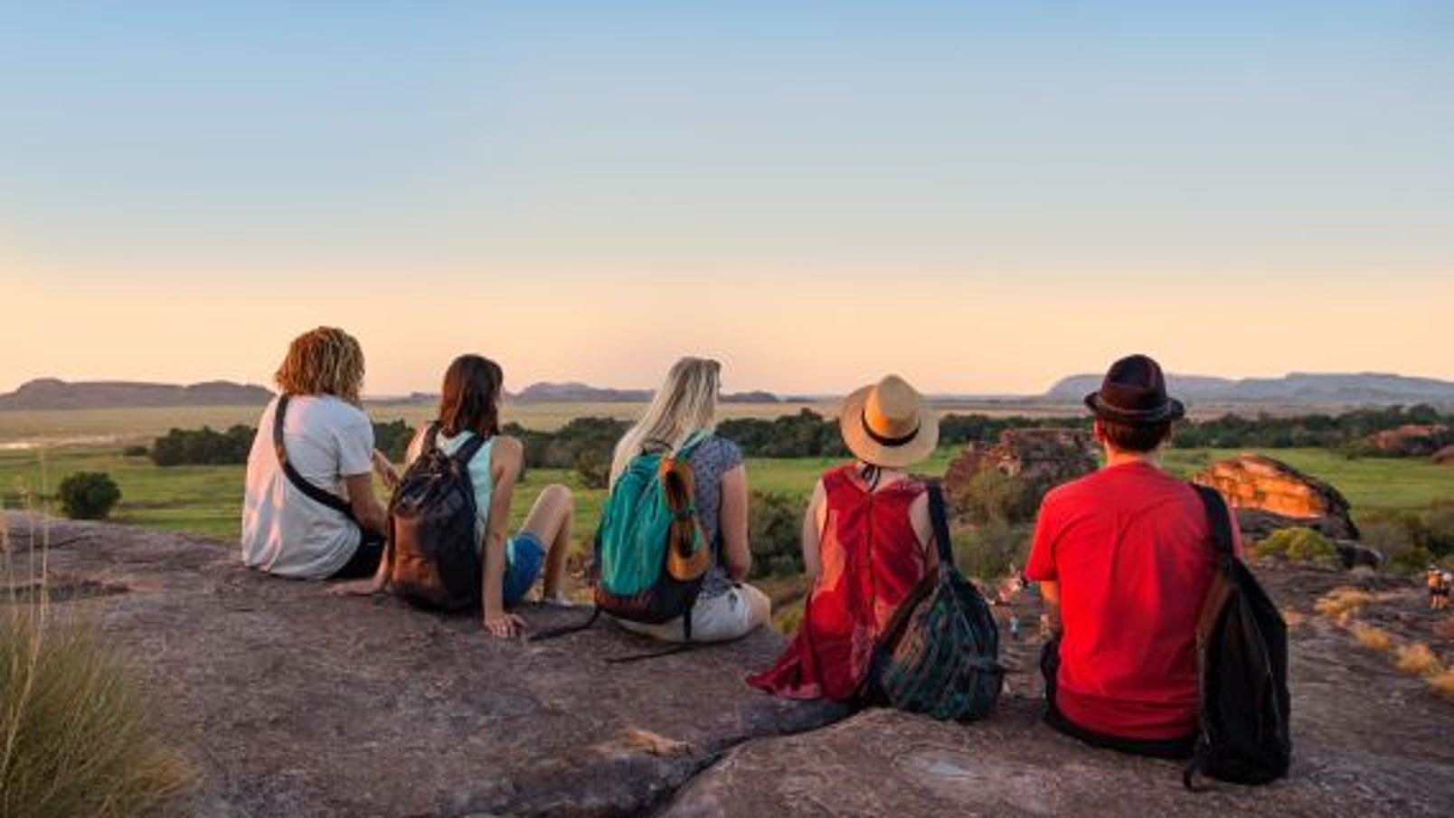 a group of people enjoying the view of ubirr at sunset in kakadu.jpg