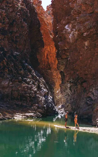 Couple relaxing at Redbank Gorge in Alice Springs
