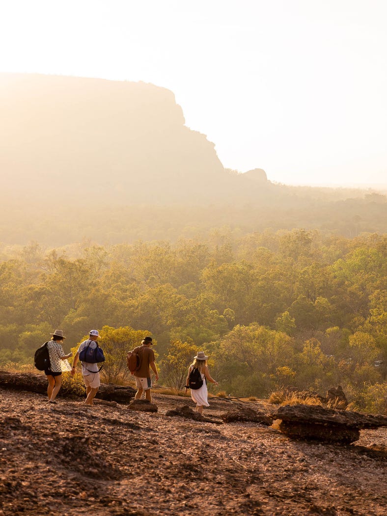 friends exploring nawurlandja lookout in kakadu national park