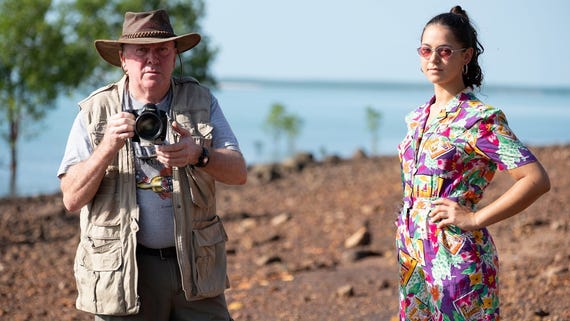 Steve and Morgan taking photos near a Beach on Tiwi islands