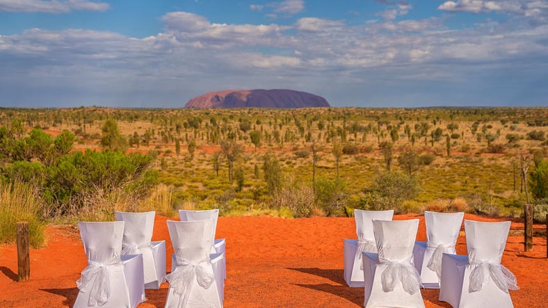 Wedding chair seeting arrangment facing Uluru